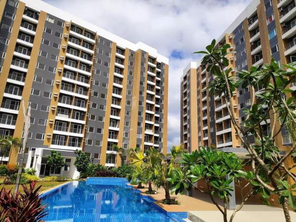 Na foto é possível ver o objeto 1 BR Taytay Condo WIFI Cignal Netflix Pool Patio localizado na cidade de Taytay.