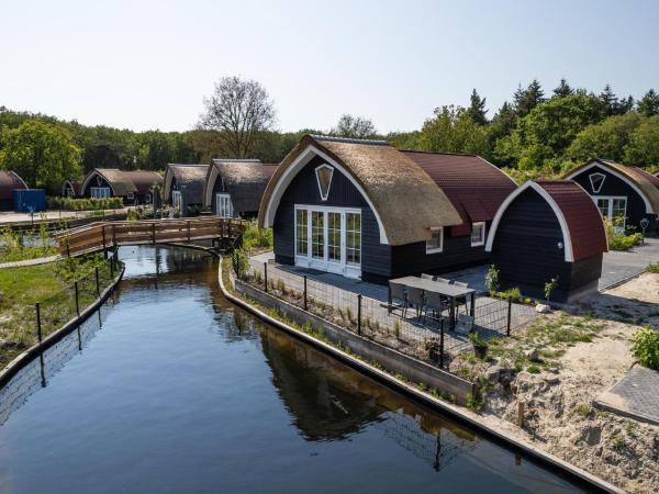 A la foto es mostra l'objecte Holiday Home in Forest near Pond situat a la ciutat de Baars.