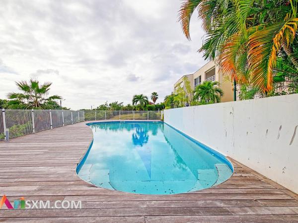 A la foto es mostra l'objecte Appartement cosy à Grand Case, proche plage, piscine, parking et Wi-Fi inclus - FR-1-734-77 situat a la ciutat de Marigot.