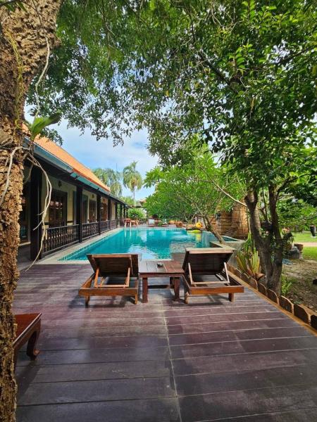 Na zdjęciu widoczny jest obiekt RenoogardenPoolvilla Pattaya położony w mieście Nong Prue.