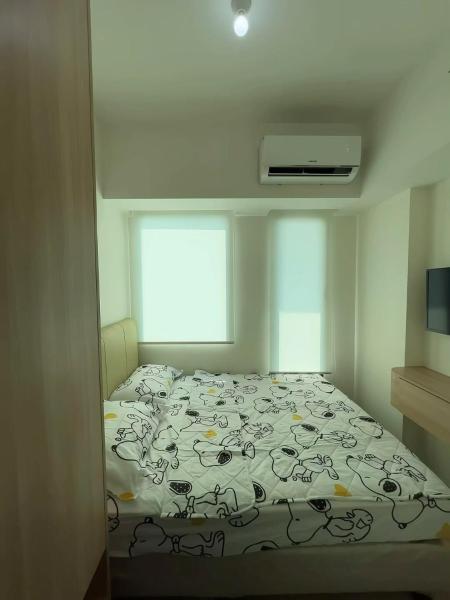 写真にはRawalumpang市にあるLuxury Stay Osaka Riverview Apartemen Pik 2が写っています。
