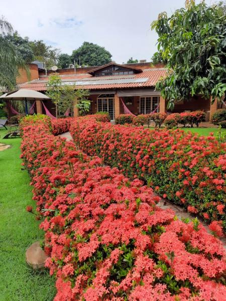 Na foto é possível ver o objeto Hotel Pousada Chalé das Flores localizado na cidade de Pitangueiras.