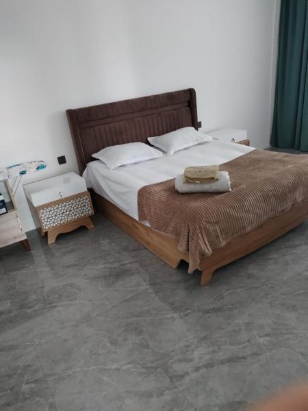 The photo shows the Melhem Twin Homes located in the city of Şǝrǝdil.