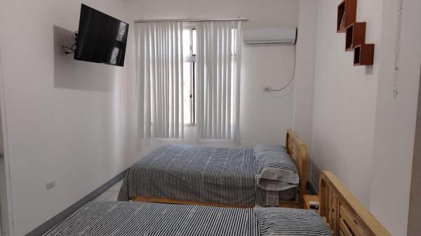 Στη φωτογραφία φαίνεται το αντικείμενο Coral, habitación de Flor de Lis Beach House που βρίσκεται στην πόλη Playas.