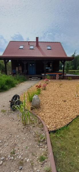 Na zdjęciu widoczny jest obiekt Rysia Polana Piasutno-Łęg Mazury położony w mieście Marksoby.