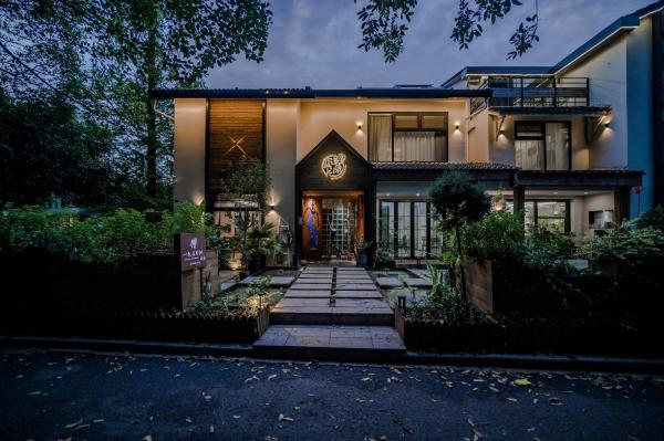 Nella foto è visibile l'oggetto Blooming Lotus Hostel situato nella città di Hangzhou.