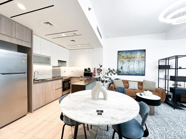 Bilde 2: Trophy - Luxurious Studio Apartment in JLT w Golf Simulator