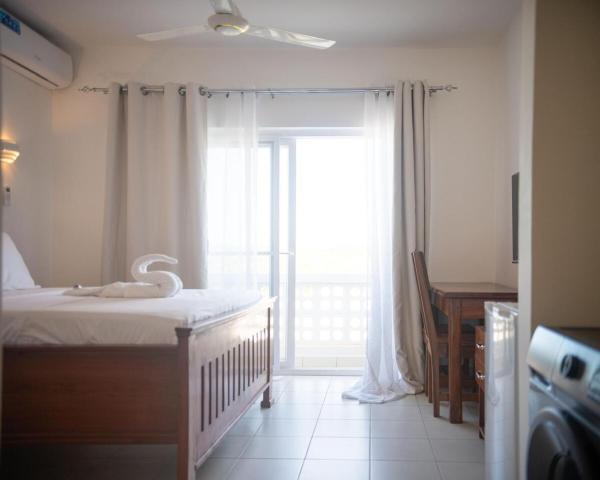 På billedet ses objektet B12-04-03 Studio, Mwangani Apartments beliggende i byen Mchamba Wima.
