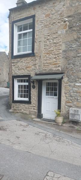 Na foto é possível ver o objeto Black Horse Cottage localizado na cidade de Settle.