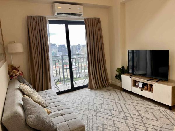 Na fotografii je vidět objekt Grand Residences 2-Bedroom Unit 2719 nacházející se ve městě Mabolo.