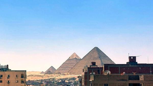 Nella foto è visibile l'oggetto CHEOPS PYRAMIDS VIEW Apartment situato nella città di Il Cairo.