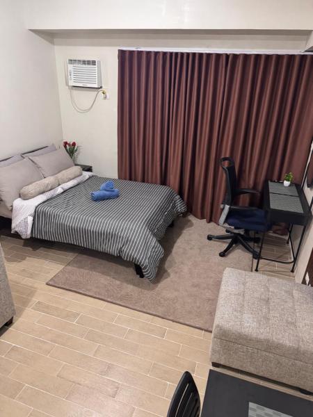 Na zdjęciu widoczny jest obiekt Luxury Home Comfort At Manhattan Plaza Cubao WiFi położony w mieście Sampong.