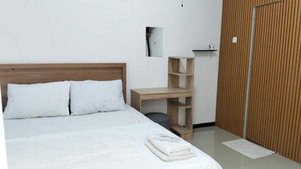 A la foto es mostra l'objecte Villa D'Shanon Batu situat a la ciutat de Tlekung.