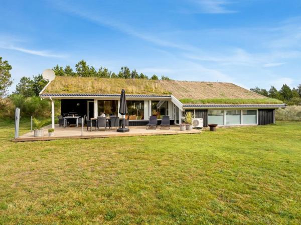 A la foto es mostra l'objecte Holiday Home Helene - 1-5km from the sea by Interhome situat a la ciutat de Blokhus.
