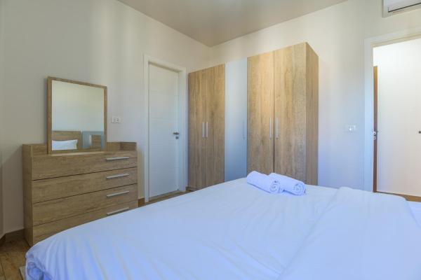 Фотография 7: Elevate - Sleek 2-BR Apt by Santa Maria, Jal el Dib