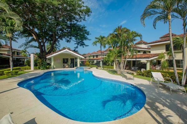 A la foto es mostra l'objecte Gorgeous Three Bedroom Townhouse situat a la ciutat de Coco.