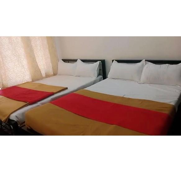 Na zdjęciu widoczny jest obiekt Hotel Guest Inn położony w mieście Mysuru.