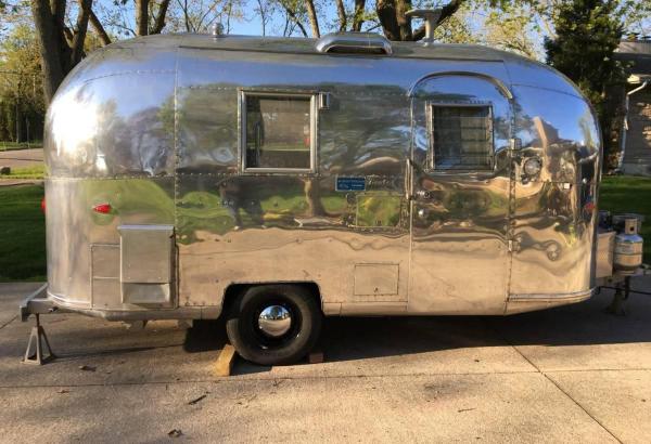 The photo shows the Airstream Travel Trailer Camper located in the city of Barisāl.