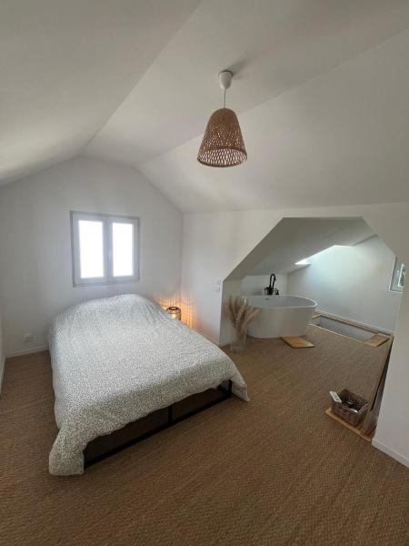 På billedet ses objektet Maison cosy et jardin à 15 min de Strasbourg centre beliggende i byen Hoenheim.