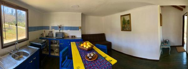 The photo shows the Kaape House located in the city of Hualañé.