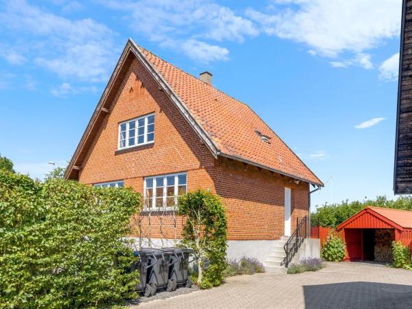 The photo shows the Holiday Home Bernadeta - 500m from the sea by Interhome located in the city of Aså.