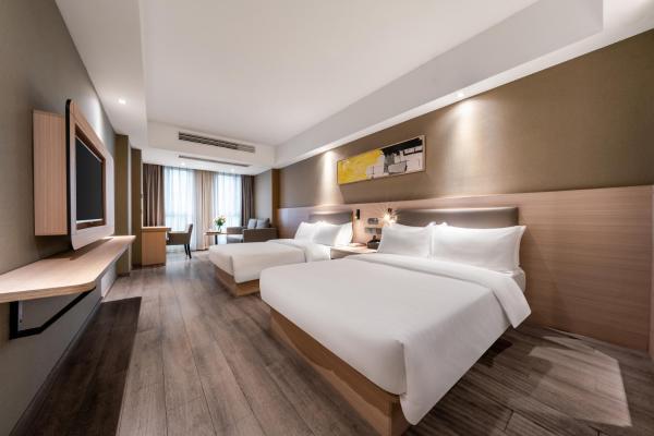 Op de foto is het object Shengfeng Mingzuo Hotel te zien, gelegen in de stad Xinliangting.