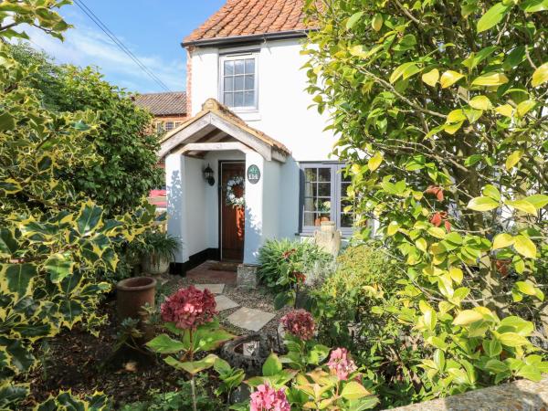 A la foto es mostra l'objecte Hollyhedge Cottage situat a la ciutat de Briston.