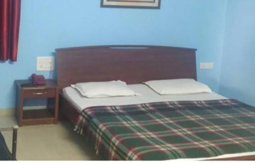Na fotografii je vidět objekt Nisha Rooms nacházející se ve městě Māvalli.