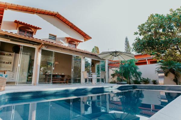 A la foto es mostra l'objecte Casa Aconchegante com Área Gourmet e Piscina situat a la ciutat de Jucu.