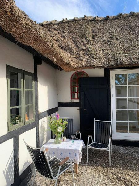 A la foto es mostra l'objecte Nostalgic Charm In Lolland Timber House situat a la ciutat de Øster Ulslev.