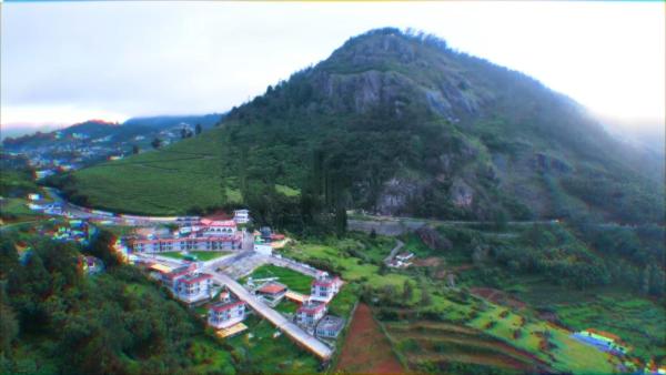 A la foto es mostra l'objecte Tulips Resorts - Village situat a la ciutat de Ooty.