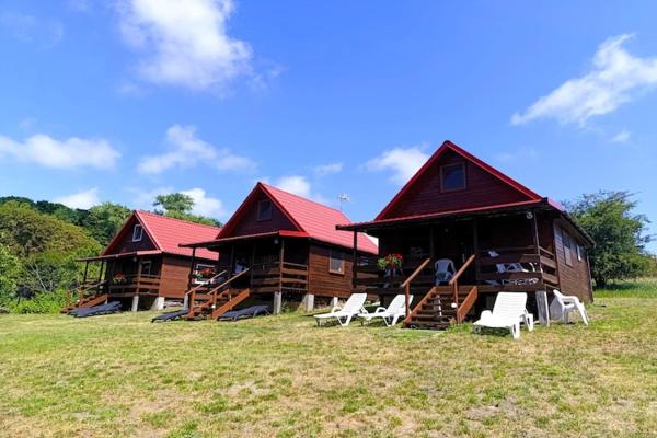 A la foto es mostra l'objecte Wooden House in Lubin by Lake Wicko situat a la ciutat de Lubin.