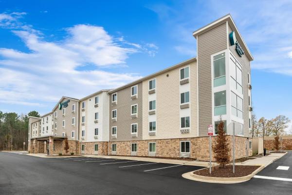 A la foto es mostra l'objecte WoodSpring Suites Richmond Airport situat a la ciutat de Capitol View.