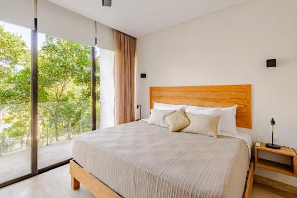 Na zdjęciu widoczny jest obiekt Tulum City Apartments Karanda położony w mieście Tulum.