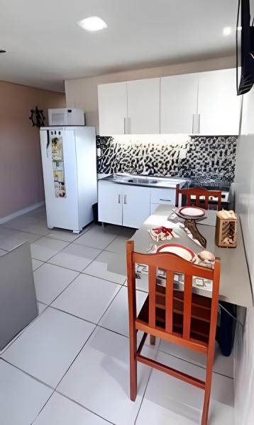 A la foto es mostra l'objecte Apartamento térreo climatizado próximo a praia situat a la ciutat de Itapema.