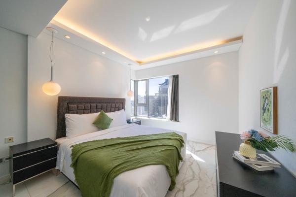 A la foto es mostra l'objecte Comfortable 2BR Apartment Steps from Xujiahui Metro situat a la ciutat de Xangai.