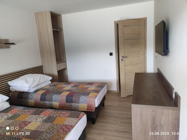 Op de foto is het object Ośrodek Wypoczynkowy Sosenka te zien, gelegen in de stad Trzebin.