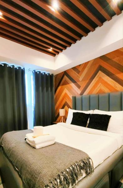 写真にはサンフェルナンド市にあるModern Elegance Escape in Azure North Bali Tower near Malls, Airport and NLEXが写っています。