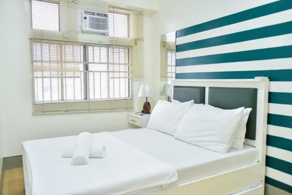 A la foto es mostra l'objecte Modern Spacious 2BR Condo with Wifi at Aurora Gardens San Juan City near Rob Magnolia situat a la ciutat de Manila.