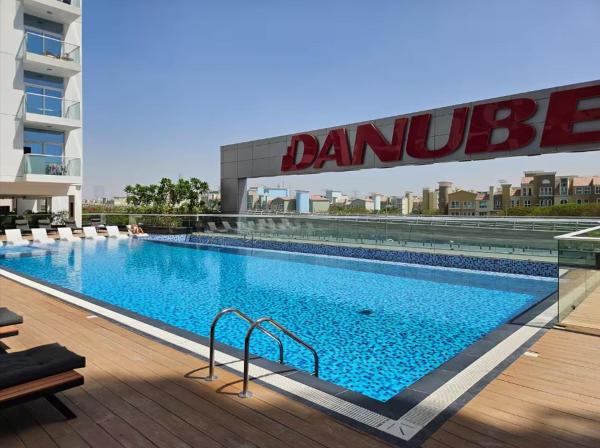 Na zdjęciu widoczny jest obiekt FIRST CLASS 2BR Chic Getaway Close to Metro położony w mieście Dubaj.