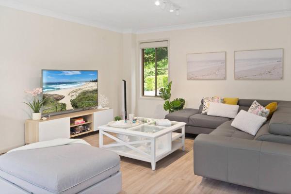 A la foto es mostra l'objecte Tranquil 3BR THome w Spa bath, BBQ & EV Parking situat a la ciutat de Figtree.