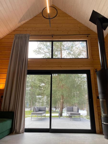 A la foto es mostra l'objecte Na Wrzosowej, domy na wsi PREMIUM situat a la ciutat de Różanów.