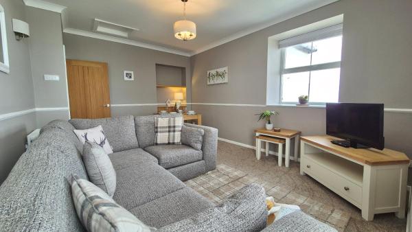 A la foto es mostra l'objecte Sunrise Cottage situat a la ciutat de Llanddulas.