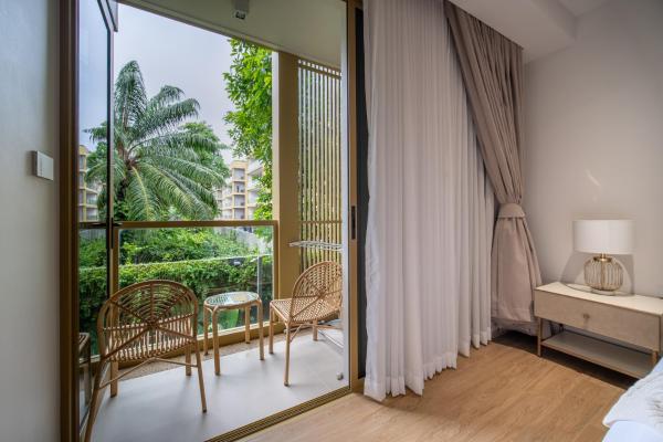 Na zdjęciu widoczny jest obiekt Beachside 1 BR apartment by NLA położony w mieście Bang Tao Beach.