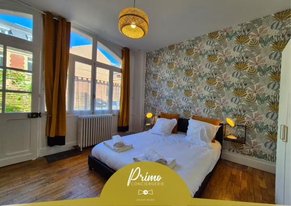 A la foto es mostra l'objecte La Cloche d'Or - lit King Size et Parking privé situat a la ciutat de Arras.