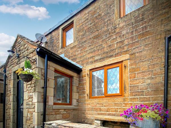 A la foto es mostra l'objecte Weavers Cottage situat a la ciutat de Barrowford.