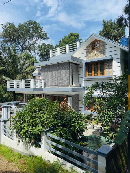Na zdjęciu widoczny jest obiekt Sara's HomeStay Munnar Kerala położony w mieście Munnar.