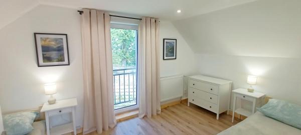 A la foto es mostra l'objecte Pine Peak Holiday House Sosnówka situat a la ciutat de Sosnówka.