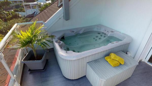 Foto 5: Mango Loft with Jacuzzi in Orient Bay