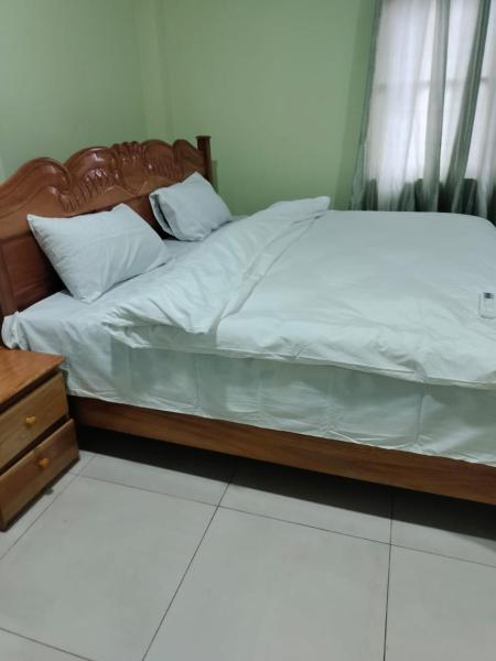 A la foto es mostra l'objecte SM Guest House situat a la ciutat de Trofwi.